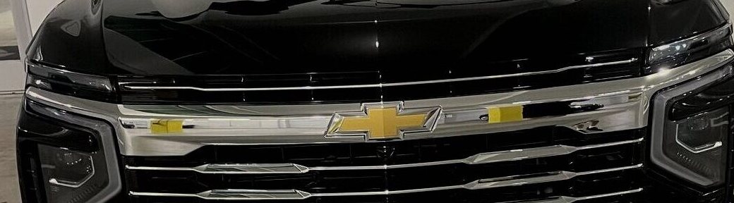 Front view of a black Chevrolet Suburban